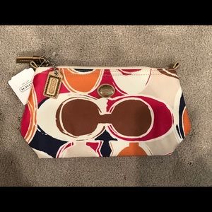 Brand new Coach mini pouch